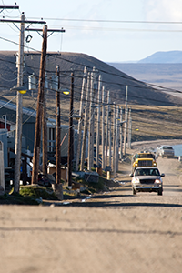 Utility poles lining a street on Baffin Island.