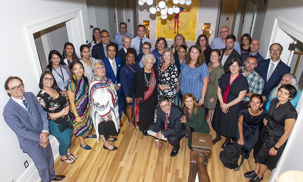 Employees from NRCan pose with the Deputy Minister and Associate Deputy Minister of NRCan for the official opening of the Circle of Nations Learning Center